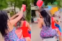 Hai cô gái chơi trò quái đản tắm gội khi đang lái xe