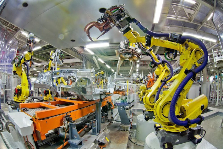 4. Robot và trí tuệ nhân tạo (AI). Tesla dự đoán rằng trong tương lai, các máy móc sẽ được lập trình để thực hiện những nhiệm vụ phức tạp. Ảnh: Pinterest.