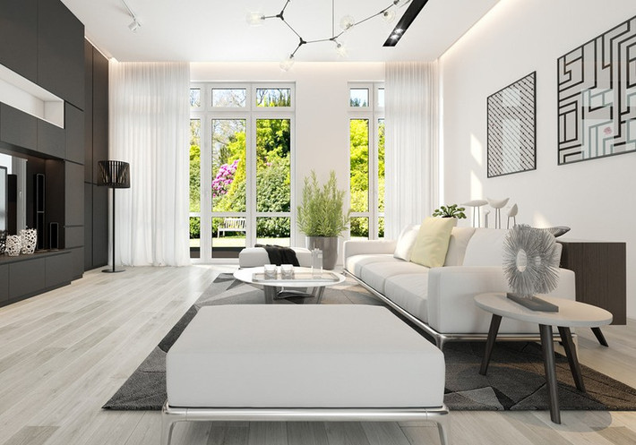 Phòng khách chỉ rộng 20m2, nhưng vẫn là không gian đầy nghệ thuật với tường trắng và đen đối lập.