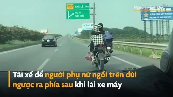 Video: Người phụ nữ ngồi trên đùi tài xế môtô
