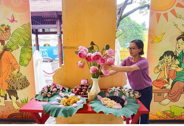Tết Đoan ngọ còn là thời điểm vàng để thực hiện các nghi lễ tạo phúc, thu hút năng lượng tích cực cho gia đình. Ảnh: Báo Bình Phước. tet-doan-ngo-2-7519.png