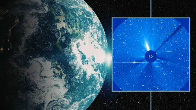 "Một cơn bão mặt trời cấp S4 đang trong quá trình hình thành. Đây là cơn bão bức xạ mặt trời lớn nhất trong 20 năm qua", SWPC thông tin. Ảnh: Inset: ESA/SOHO, image created in Canva Pro.