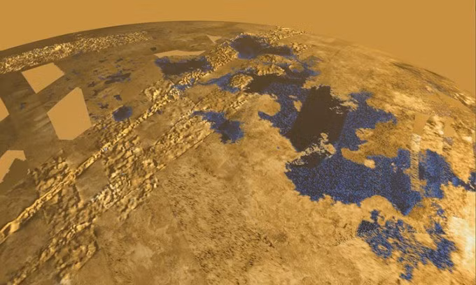 Theo các nhà khoa học, trên mặt trăng Titan cũng có mưa nhưng mưa được tạo thành từ mêtan chứ không phải là ôxít hydro. Các nhà khoa học đã và đang thu thập những dữ liệu về các hồ nước trên Titan để tìm hiểu thêm về những đặc điểm hóa học và chu kỳ lượng mưa trên mặt trăng này. Ảnh: Planetary Mechanics.