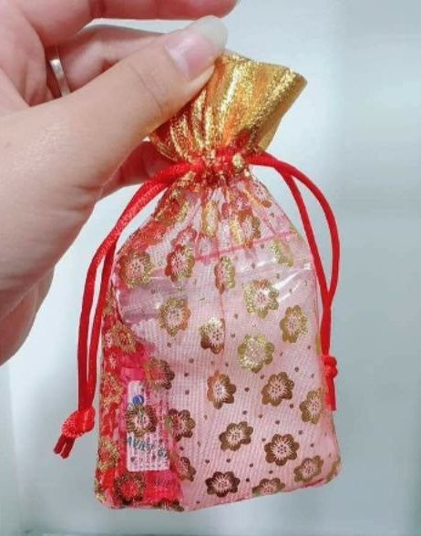 Âm thầm bỏ 5 vật này vào ví đầu năm để tài lộc dồi dào - Hình 2 Am tham bo 5 vat nay vao vi dau nam de tai loc doi dao-Hinh-2