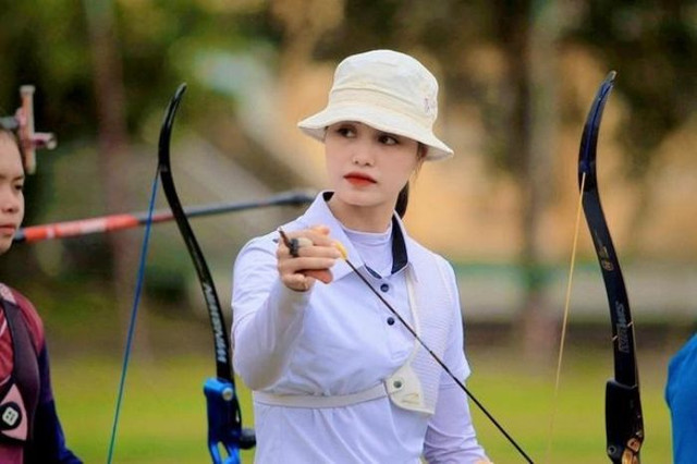 Ảnh xinh như hoa hậu của cung thủ được mệnh danh mũi tên vàng tại SEA Games 31 - Hình 2 Anh xinh nhu hoa hau cua cung thu duoc menh danh mui ten vang tai SEA Games 31-Hinh-2