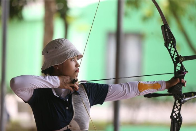 Ảnh xinh như hoa hậu của cung thủ được mệnh danh mũi tên vàng tại SEA Games 31 - Hình 3 Anh xinh nhu hoa hau cua cung thu duoc menh danh mui ten vang tai SEA Games 31-Hinh-3
