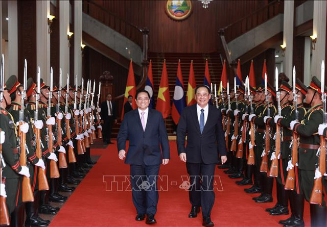 Thủ tướng Phạm Minh Chính gặp Thủ tướng Lào Sonexay Siphandone Thu tuong Pham Minh Chinh gap Thu tuong Lao Sonexay Siphandone