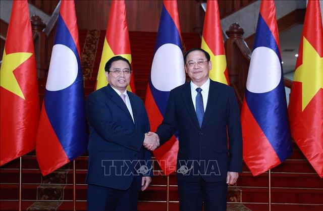 Thủ tướng Phạm Minh Chính gặp Thủ tướng Lào Sonexay Siphandone - Hình 2 Thu tuong Pham Minh Chinh gap Thu tuong Lao Sonexay Siphandone-Hinh-2
