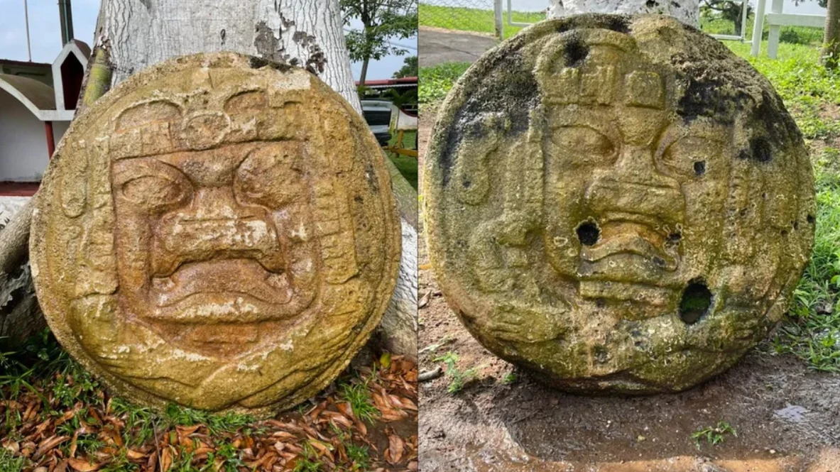 Hai tấm bia tròn khắc họa khuôn mặt người kinh dị