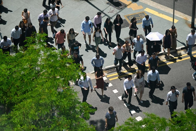 Singapore là một trong những quốc gia tiêu biểu trong việc xây dựng và vận hành hiệu quả hệ thống trả lương công chức theo vị trí việc làm. Ảnh: The Straits Times. 01.jpg