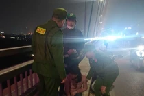 Nguyên nhân vụ người phụ nữ định tự tử tại cầu Nhật Tân 