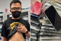Giấu 64 điện thoại trên người khi nhập cảnh tại Cảng hàng không Nội Bài