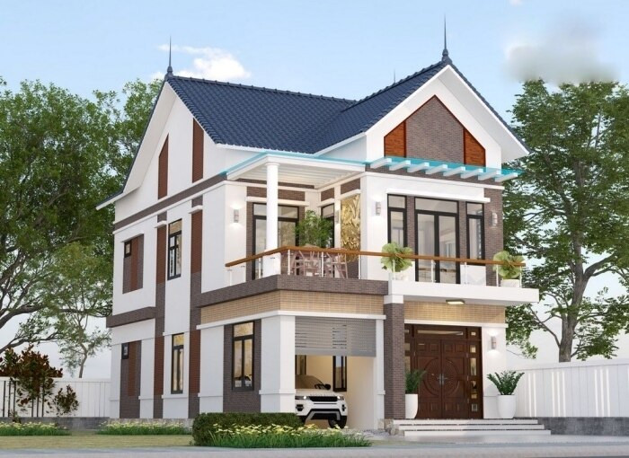 Thiết kế nhà mái thái 2 tầng có gara là xu hướng chủ đạo trong năm 2023. Gara không chỉ để xe mà có thể sử dụng làm nơi kinh doanh hay nhà kho. Phần gara ô tô được thiết kế khéo léo tạo điểm nhấn cho công trình. (Ảnh: Wedo)