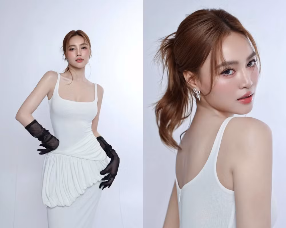 Thiết kế bèo nhúm lạ mắt ở phần eo kết hợp cùng đôi găng tay đen đã tạo điểm nhấn độc đáo, mang đến tổng thể thời trang vừa sang trọng vừa hiện đại.