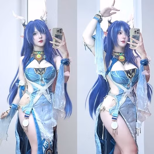 Với mái tóc xanh tím nổi bật, đôi tai nhọn quen thuộc cùng trang phục gợi cảm được cắt xẻ tinh tế, nữ coser này đã khiến người xem khó có thể rời mắt.