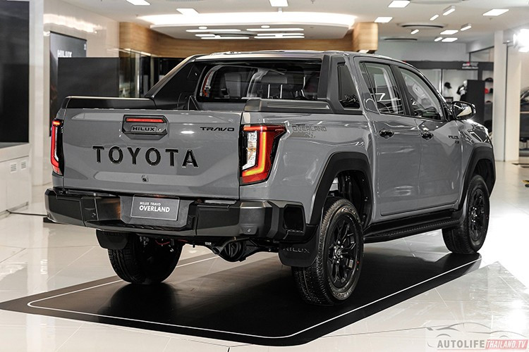 "TRAVO" được Toyota lấy cảm hứng từ sự kết hợp giữa "Travel" (Du lịch) và "Voyage" (Hành trình), thể hiện tinh thần khám phá và phiêu lưu. Đối với phiên bản tiêu chuẩn (Low-rider) Hilux REVO hiện tại vẫn sẽ tiếp tục được bán ra khoảng 1 năm nữa nhưng được bổ sung thêm trang bị an toàn tiêu chuẩn như Cảnh báo tiền va chạm (FCW), Cảnh báo xe phía trước di chuyển (TMN) và cổng sạc USB-C.