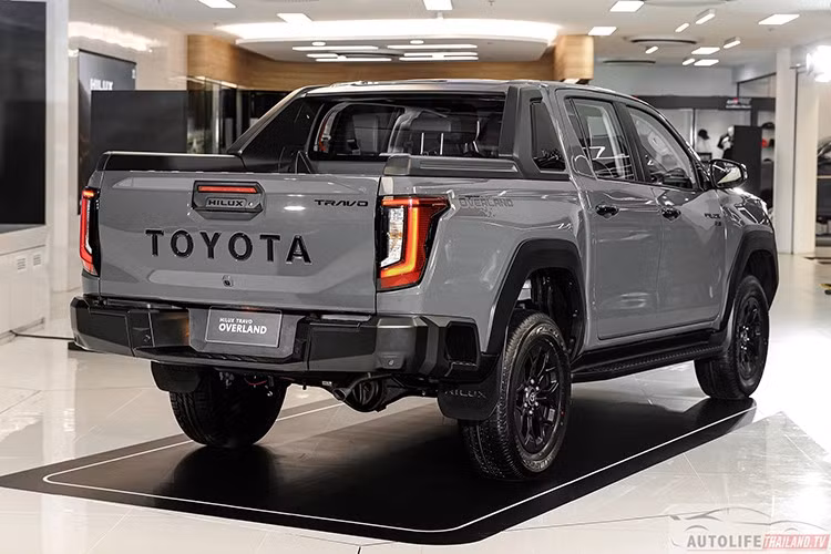 "TRAVO" được Toyota lấy cảm hứng từ sự kết hợp giữa "Travel" (Du lịch) và "Voyage" (Hành trình), thể hiện tinh thần khám phá và phiêu lưu. Đối với phiên bản tiêu chuẩn (Low-rider) Hilux REVO hiện tại vẫn sẽ tiếp tục được bán ra khoảng 1 năm nữa nhưng được bổ sung thêm trang bị an toàn tiêu chuẩn như Cảnh báo tiền va chạm (FCW), Cảnh báo xe phía trước di chuyển (TMN) và cổng sạc USB-C.