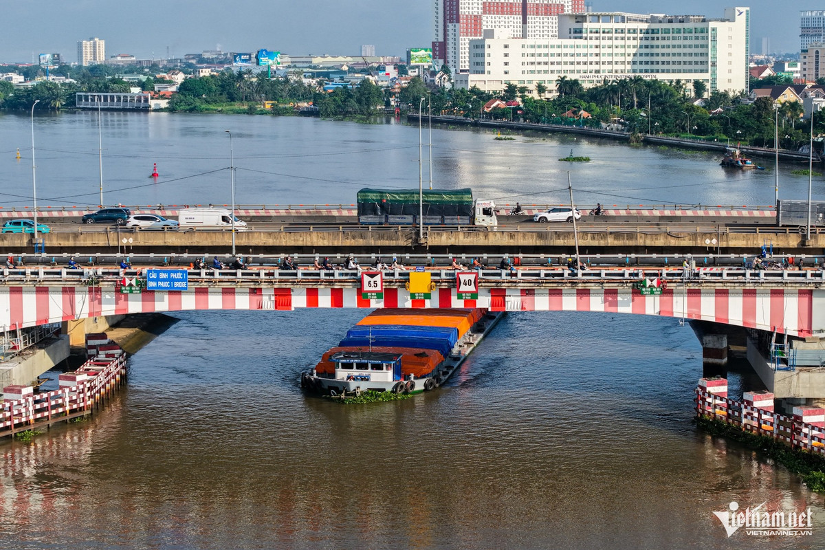 View - Dựng cầu sắt tạm để nâng cầu Bình Phước 1 cao thêm 1,25m | Báo Tri thức và Cuộc sống - TIN TỨC PHỔ BIẾN KIẾN THỨC 24H