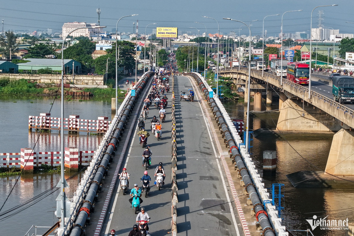 View - Dựng cầu sắt tạm để nâng cầu Bình Phước 1 cao thêm 1,25m | Báo Tri thức và Cuộc sống - TIN TỨC PHỔ BIẾN KIẾN THỨC 24H