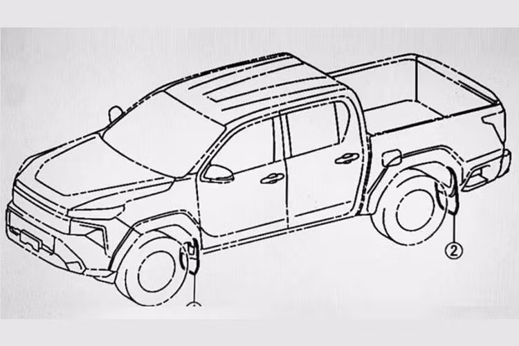 Nội thất cũng ghi nhận một số chi tiết tiện dụng như hai hộc để đồ cho ghế phụ, khay để điện thoại dưới khe gió trung tâm, và một khu vực nghiêng phía trước cần số – có thể là ngăn chứa đồ hoặc bảng điều khiển điều hòa. Nếu đúng như trên Prado, cụm điều hòa sẽ nằm ngay dưới cửa gió trung tâm, thiết kế theo kiểu nút bấm truyền thống.