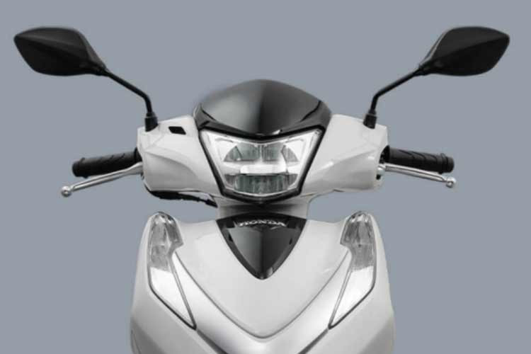 Điểm nhấn đáng chú ý nhất trên mẫu xe mới nằm ở phần mặt nạ và cụm đèn pha. Cách bố trí này được đánh giá là có nhiều nét tương đồng với mẫu xe ga cao cấp Honda SH300i nhưng đã được tinh chỉnh lại nhỏ gọn để phù hợp với phân khúc 125cc.