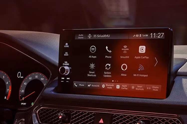 Chưa hết, Acura còn trang bị tiêu chuẩn Apple CarPlay và Android Auto không dây, kết hợp sạc điện thoại không dây. Mẫu xe Acura Integra 2026 này sẽ có mặt tại các đại lý từ tháng 8/2025, vẫn giữ hộp số vô cấp CVT hoặc hộp số sàn 6 cấp cho những ai thích cảm giác lái thể thao.