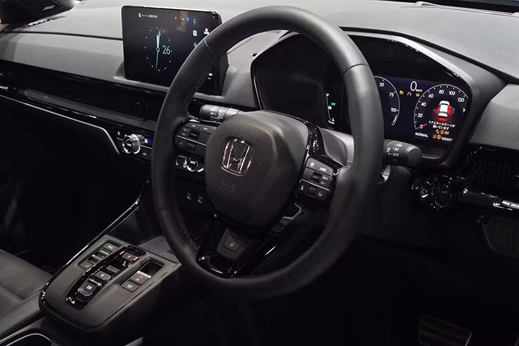 Ngoài ra, cần số dạng cần truyền thống cũng được thay bằng hệ thống nút bấm điện tử e-Shifter, góp phần hiện đại hóa khoang lái.