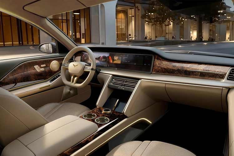 Bên trong khoang lái, Lạc Hồng 900S mở ra một không gian thượng lưu với sự kết hợp của da Nappa cao cấp, gỗ quý và các chi tiết mạ vàng tinh xảo. Xe được trang bị hàng loạt tiện ích đặc quyền như ghế không trọng lực, cửa đóng mở tự động và hệ thống giải trí hi-end.