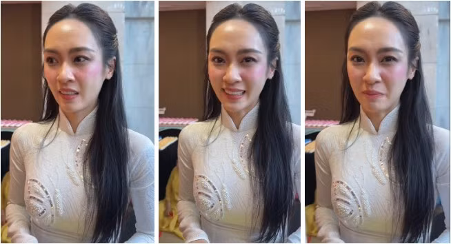 Thúy Quỳnh diện chiếc áo dài trắng với họa tiết hoa văn chìm tinh xảo trên nền vải. Điểm nhấn là chi tiết đính kết hình cánh bướm bằng ngọc trai và hạt lấp lánh ở phần ngực, tôn lên sự trang nhã và duyên dáng. Nàng Á hậu giữ kiểu tóc dài, suôn thẳng, phần mái được vén gọn gàng ra sau, tạo cảm giác thanh thoát và làm nổi bật khuôn mặt trái xoan.