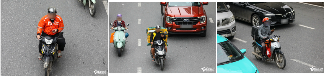 Trên đường Hồ Tùng Mậu (hướng đi Xuân Thủy, Hà Nội), vào thời điểm ghi nhận, nhiều shipper (người giao hàng) dùng điện thoại khi đang điều khiển xe máy.