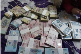 Đổi tiền lẻ, tiền mới ở đâu để không vi phạm pháp luật?