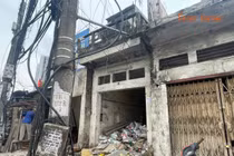 Giải phóng mặt bằng chưa 'chốt hạ', đường Tam Trinh vẫn ngổn ngang phế thải