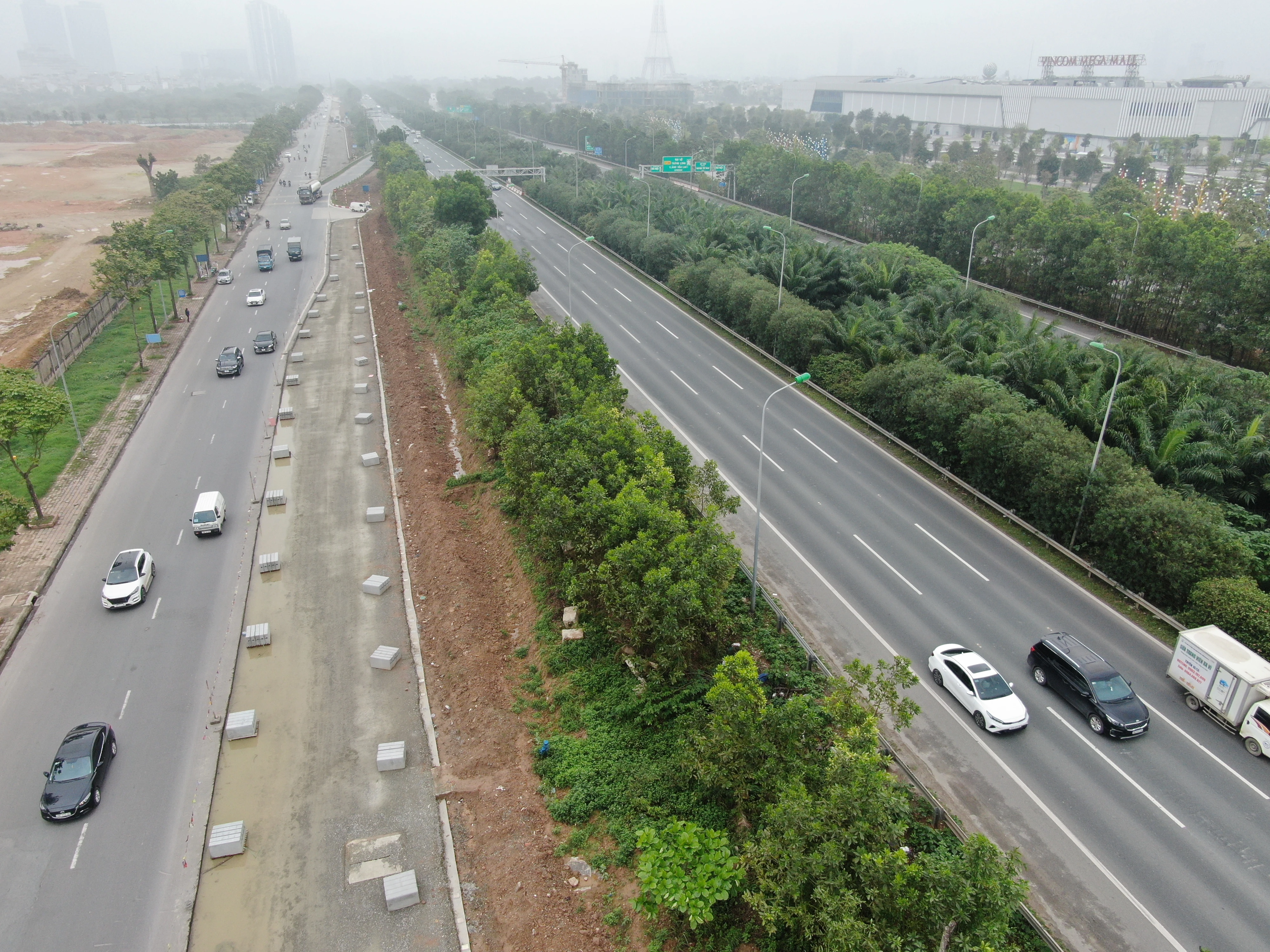 Hà Nội mở rộng gấp đôi đường gom đại lộ Thăng Long chống úng ngập