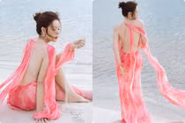 "Phú bà" Lý Nhã Kỳ gợi cảm với đầm xẻ cao, hở trọn tấm lưng