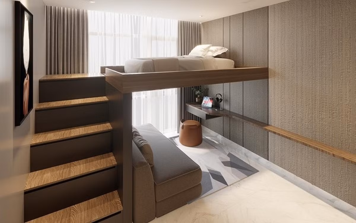 Phòng ngủ có giường thiết kế trên cao, dưới là ghế sofa để nghỉ ngơi. Ảnh: FBNV