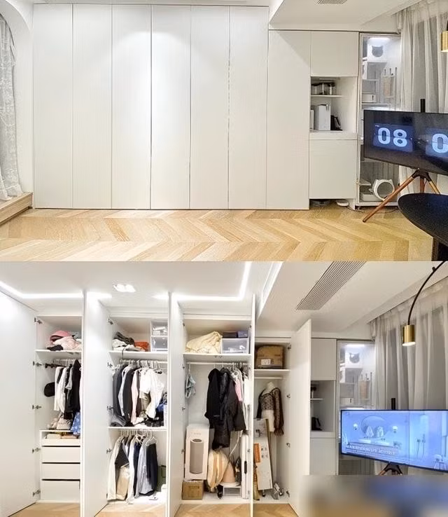 Phòng khách có tủ gắn tường chứa gần nửa căn nhà, TV xoay 360 độ giúp bạn xem thoải mái ở nhiều vị trí. Ảnh: Rebecca Becky