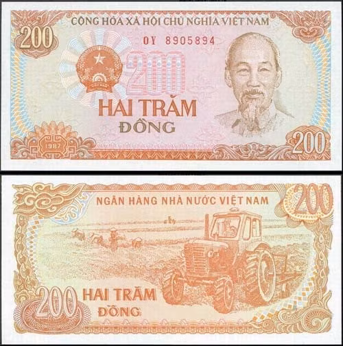 Tờ tiền 200 đồng vẫn đang lưu hành nhưng không còn được sử dụng phổ biến trong các giao dịch hàng ngày vì giá trị quá thấp. Ảnh: Người lao động