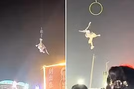 Nữ nghệ sĩ xiếc tuột tay, ngã từ vòng tròn biểu diễn xuống đất 