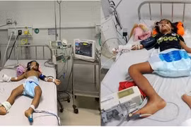 2 bệnh nhi bị ngộ độc lúc nhập viện điều trị. Ảnh adn.com.vn