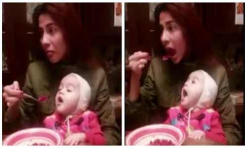 Bà mẹ trêu con gái cực đáng yêu