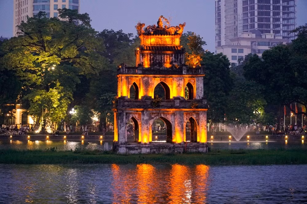 ve-tham-thap-rua-bieu-tuong-du-lich-tam-linh-giua-long-ha-noi-03-1640113393.jpg