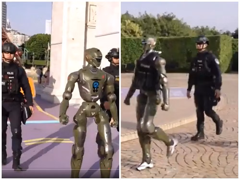 Robot có ngoại hình tương đương người trưởng thành, di chuyển tự tin giữa khu du lịch đông người, gợi liên tưởng đến các bộ phim khoa học viễn tưởng.