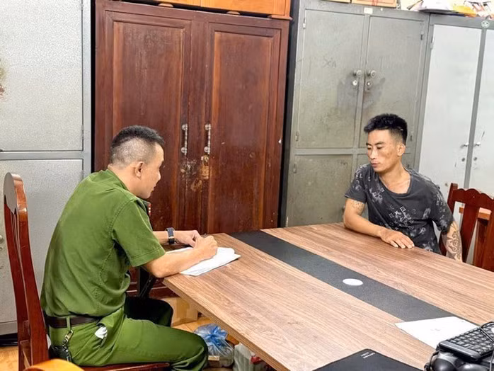 Nghi phạm Mai Đức Giang tại cơ quan công an - Ảnh: Công an cung cấp