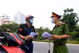 Gallery - GIẤY ĐI ĐƯỜNG Ở HÀ NỘI - image 1