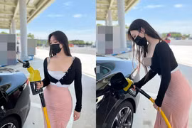 Đứng đổ xăng, gái xinh khoe ngực khủng "ngộp thở"