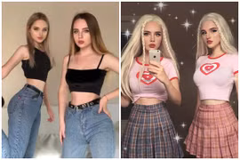 Cặp song sinh nước Nga sở hữu vòng eo nhỏ xíu bằng gang tay