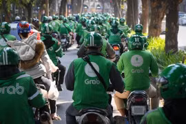 Tăng thu khấu trừ khiến tài xế bức xúc, Grab nói gì?