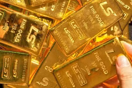 Giá vàng lao dốc, mất mốc 1.800 USD/ounce