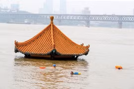 Trung Quốc liên tiếp nâng báo động lũ, hàng triệu người khốn khổ