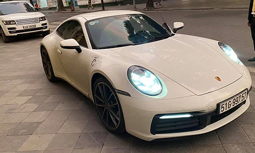 Vợ chồng Cường Đô la "cưỡi" Porsche 911 gần 8 tỷ ra Hà Nội 